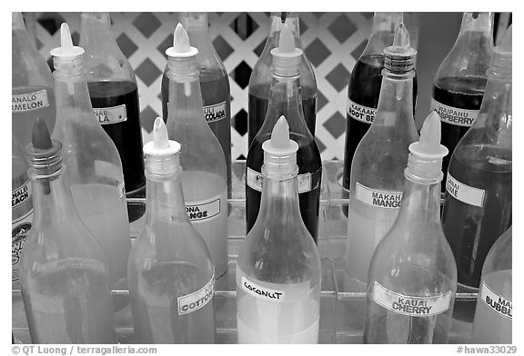 Variety of sirup flavors used in shave ice. Waikiki, Honolulu, Oahu island, Hawaii, USA (black and white)