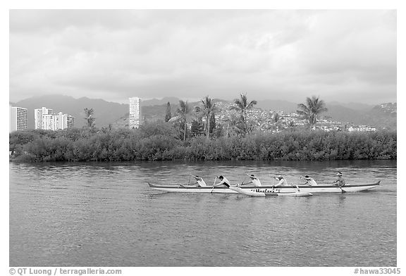 Outrigger canoe along the Ala Wai Canal. Waikiki, Honolulu, Oahu island, Hawaii, USA