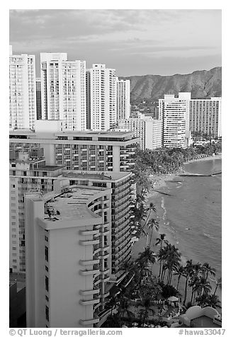 High rise hotels and beach seen from the Sheraton glass elevator, late afternoon. Waikiki, Honolulu, Oahu island, Hawaii, USA