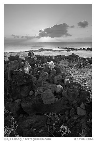 Heiau and ocean at sunrise. Oahu island, Hawaii, USA (black and white)