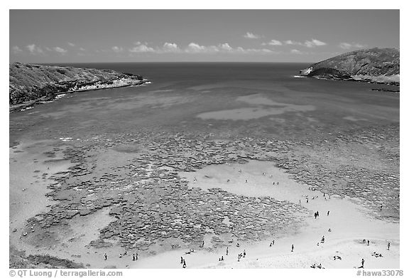 Hanauma Bay with people in water. Oahu island, Hawaii, USA (black and white)