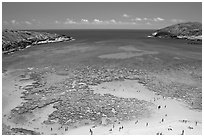 Hanauma Bay with people in water. Oahu island, Hawaii, USA ( black and white)