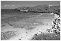 Hanauma Bay and beach with people. Oahu island, Hawaii, USA (black and white)