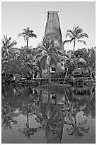 Fijian Bure Kalou, sprit house with high-reaching roof. Polynesian Cultural Center, Oahu island, Hawaii, USA (black and white)