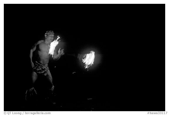 Traditional Samoan fireknife dance. Polynesian Cultural Center, Oahu island, Hawaii, USA (black and white)