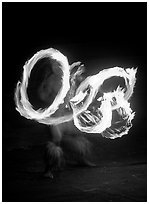 Traditional Samoan fire knife dance. Polynesian Cultural Center, Oahu island, Hawaii, USA ( black and white)