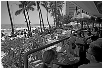 Beachside bar. Waikiki, Honolulu, Oahu island, Hawaii, USA (black and white)