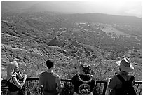 Tourists look at the  Diamond Head crater, early morning. Oahu island, Hawaii, USA (black and white)