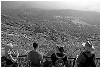 Tourists look at the  Diamond Head crater, early morning. Oahu island, Hawaii, USA ( black and white)