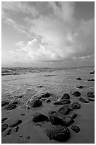 Boulders, beach and clouds, Lydgate Park, sunrise. Kauai island, Hawaii, USA ( black and white)