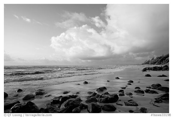 Boulders, beach and clouds, Lydgate Park, sunrise. Kauai island, Hawaii, USA