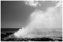 Spouting horn blow hole. Kauai island, Hawaii, USA ( black and white)