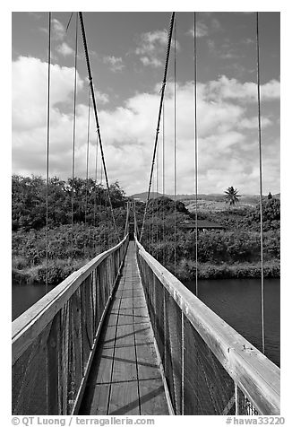 Wooden swinging bridge, Hanapepe. Kauai island, Hawaii, USA (black and white)