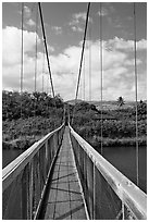 Wooden swinging bridge, Hanapepe. Kauai island, Hawaii, USA (black and white)