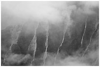 Fluted ridges seen through mist, Kalalau lookout, late afternoon. Kauai island, Hawaii, USA (black and white)