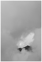 Hole in the clouds, Kalalau lookout, sunset. Kauai island, Hawaii, USA ( black and white)