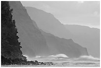 Na Pali Coast and surf seen from Kee Beach, sunset. Kauai island, Hawaii, USA ( black and white)