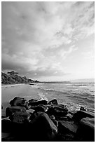 Boulders and beach, Lydgate Park, sunrise. Kauai island, Hawaii, USA (black and white)