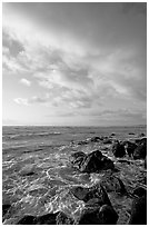 Boulders and ocean, Lydgate Park, sunrise. Kauai island, Hawaii, USA ( black and white)