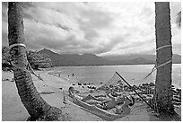 Family on Hammock with Hanalei Bay in the background. Kauai island, Hawaii, USA (black and white)