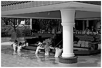 Swim-up bar, Princeville hotel. Kauai island, Hawaii, USA ( black and white)