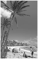 Couple and tent, Sheraton Beach, mid-day. Kauai island, Hawaii, USA ( black and white)