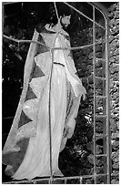 A stained glass with Jesus in traditional hawaiian robe, Palapala Hoomau church. Maui, Hawaii, USA ( black and white)