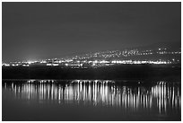 Lights reflected in Aimakapa Fishpond, Kaloko-Honokohau National Historical Park. Hawaii, USA ( black and white)