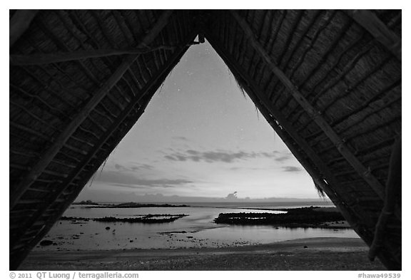 Aiopio fishtrap framed by Halau at dusk, Kaloko-Honokohau National Historical Park. Hawaii, USA