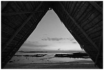 Aiopio fishtrap framed by Halau at dusk, Kaloko-Honokohau National Historical Park. Hawaii, USA ( black and white)