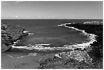 Collapsed cinder cone with green sand, South Point. Big Island, Hawaii, USA ( black and white)