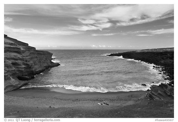 Couple on Papakolea green sand beach. Big Island, Hawaii, USA (black and white)