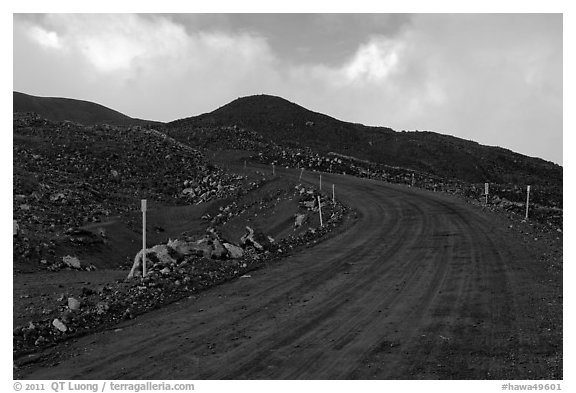 Unpaved road and volcanic landscape. Mauna Kea, Big Island, Hawaii, USA (black and white)