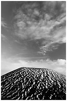 Snowy cinder cone and clouds. Mauna Kea, Big Island, Hawaii, USA (black and white)