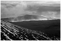 Volcanic mountains and clouds at sunset. Mauna Kea, Big Island, Hawaii, USA (black and white)