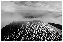 Cinder cone and sea of clouds at sunset. Mauna Kea, Big Island, Hawaii, USA ( black and white)