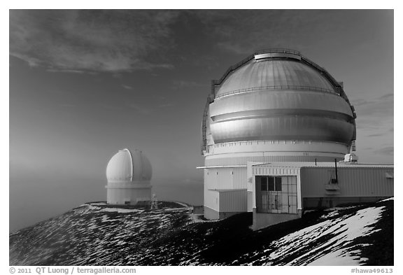 Recent snow and telescopes at sunset. Mauna Kea, Big Island, Hawaii, USA