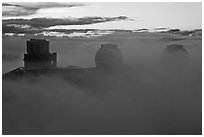 Telescopes, clouds, and fog at sunset. Mauna Kea, Big Island, Hawaii, USA (black and white)