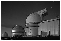 Telescopes and stars at nightfall. Mauna Kea, Big Island, Hawaii, USA ( black and white)