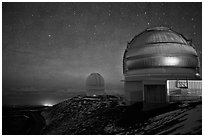 Telescopes and stars at night. Mauna Kea, Big Island, Hawaii, USA (black and white)