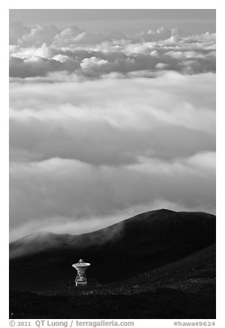 Astronomic radio antenna and sea of clouds. Mauna Kea, Big Island, Hawaii, USA