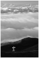 Astronomic radio antenna and sea of clouds. Mauna Kea, Big Island, Hawaii, USA (black and white)