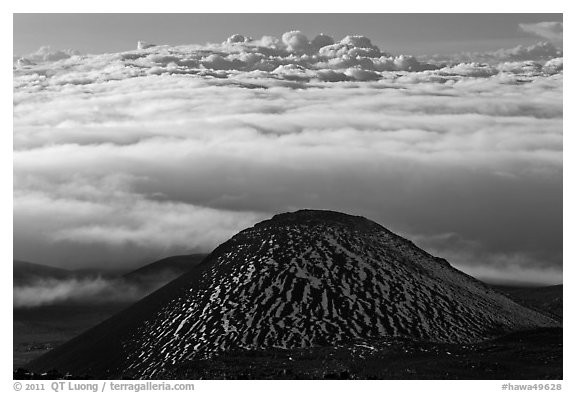 Dark cinder cone and sea of clouds. Mauna Kea, Big Island, Hawaii, USA (black and white)