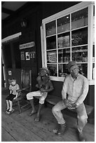 Boy looking at quirky sculptures, Ulupalakua. Maui, Hawaii, USA ( black and white)