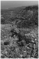 Desert-like lava flow rock and ocean, Kanalo reserve. Maui, Hawaii, USA (black and white)