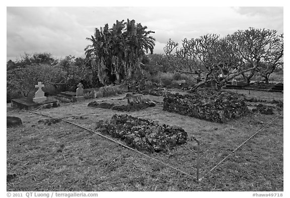 Graves made of lava rocks, Kaupo cemetery. Maui, Hawaii, USA (black and white)