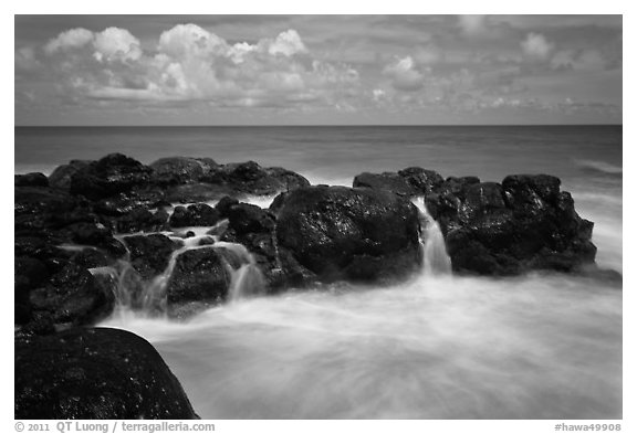 Balsalt and surf motion. Kauai island, Hawaii, USA