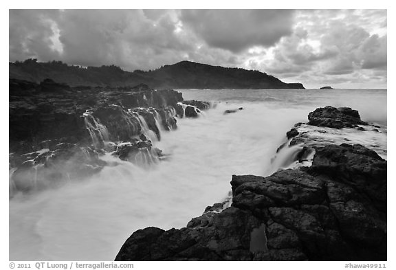 Trench carved by surf in lava bench, Mokolea Peninsula. Kauai island, Hawaii, USA