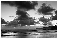 Clouds at sunrise over Kalihiwai Bay. Kauai island, Hawaii, USA ( black and white)