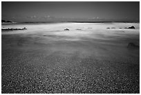 Multicolored glass and sand. Kauai island, Hawaii, USA (black and white)